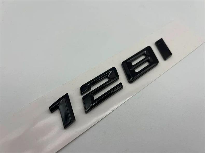 Suitable for the new BMW 116i, 118i, 120i, 125i, and 135i models; features a glossy black emblem, lettering, and tail emblem