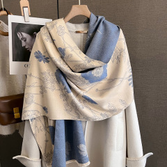 新しい秋冬の両面のプリントのファッションはカシミヤのマフラーの女性の厚いファッションの学生のマントの韓国版のマフラーの防寒をまねます。