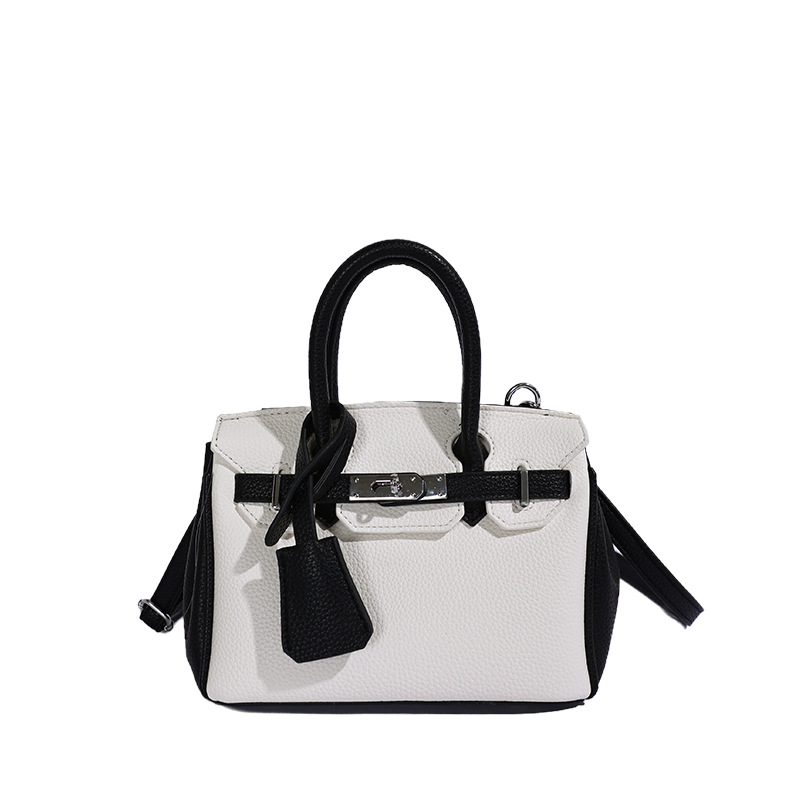 Bolso de platino portátil de litchi para mujeres 2026 comercio exterior nuevo estilo de alto nivel de sensación de tamaño de estilo de hombro mochila