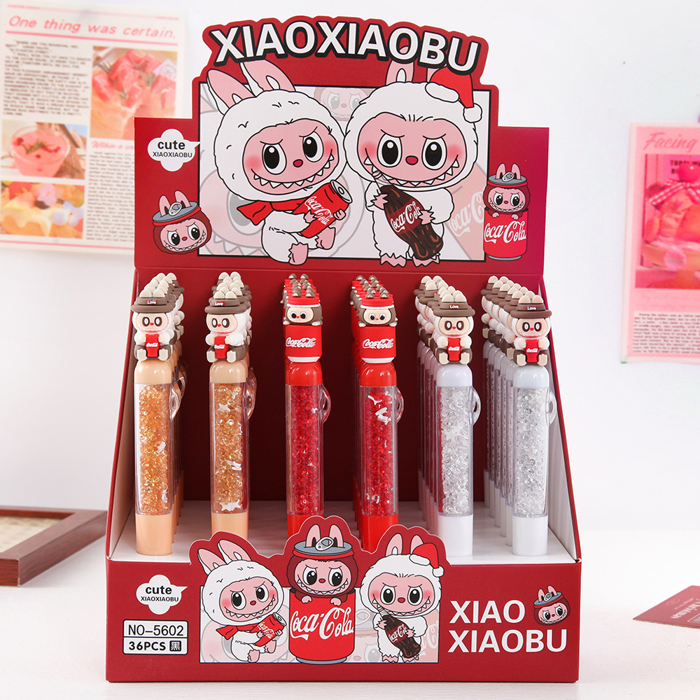 Caricaturas pequeñas Buda soda bolígrafo neutro de alto valor facial grano de aluminio suave diamante flash bolígrafo azul de comercio exterior artículos de papelería para estudiantes