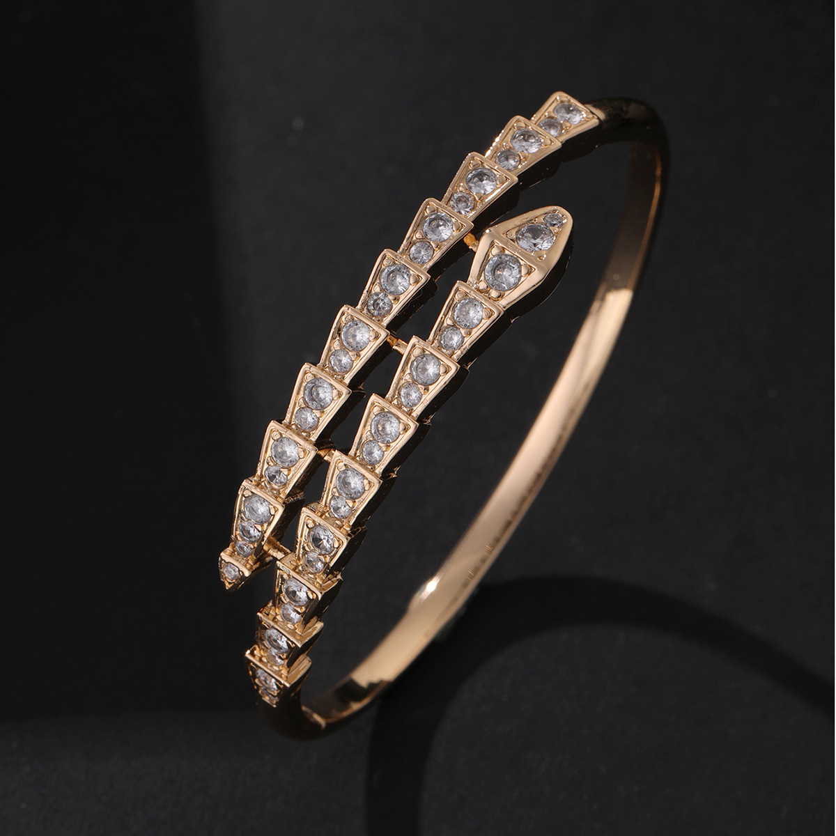 golden copper bracelet with zircon