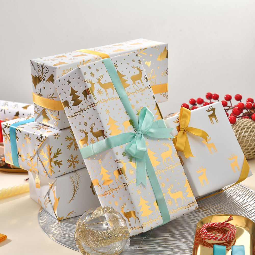 Navidad nuevo brillante papel de bronce estampado árbol de Navidad copo de nieve regalo de Navidad papel de embalaje de regalo al por mayor