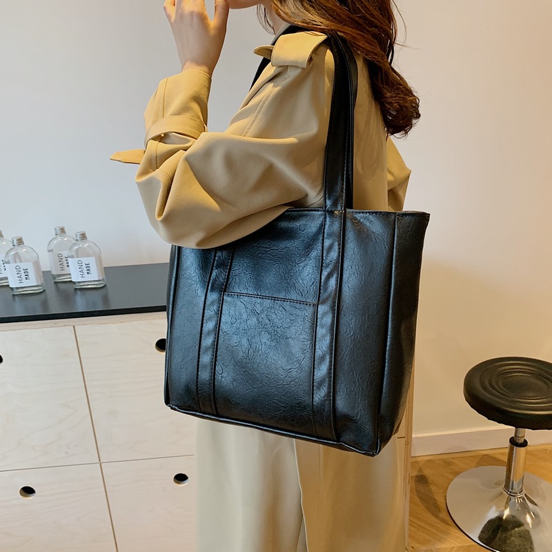 Bolsa de gran capacidad para mujeres 2024 nuevo estilo americano bolsas de compras de mano textura bolsas de hombro pu bolsas casuales simples