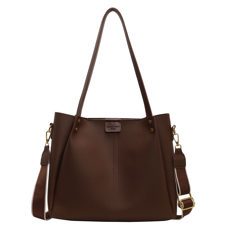 Bolsas de gran capacidad de explosión transfronteriza para mujeres 2025, nuevas bolsas de mochila versátiles, bolsas de cubo casuales simples.