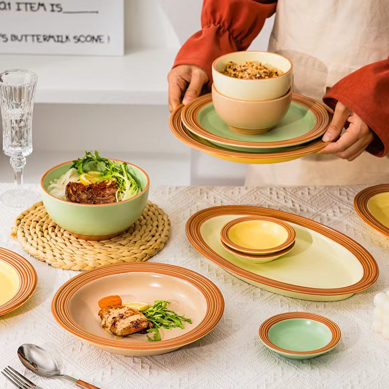 Simple cubiertos de cerámica nórdica crema doméstica platos de viento conjunto de platos de arroz anti-escaldado platos de pescado platos de platos al por mayor