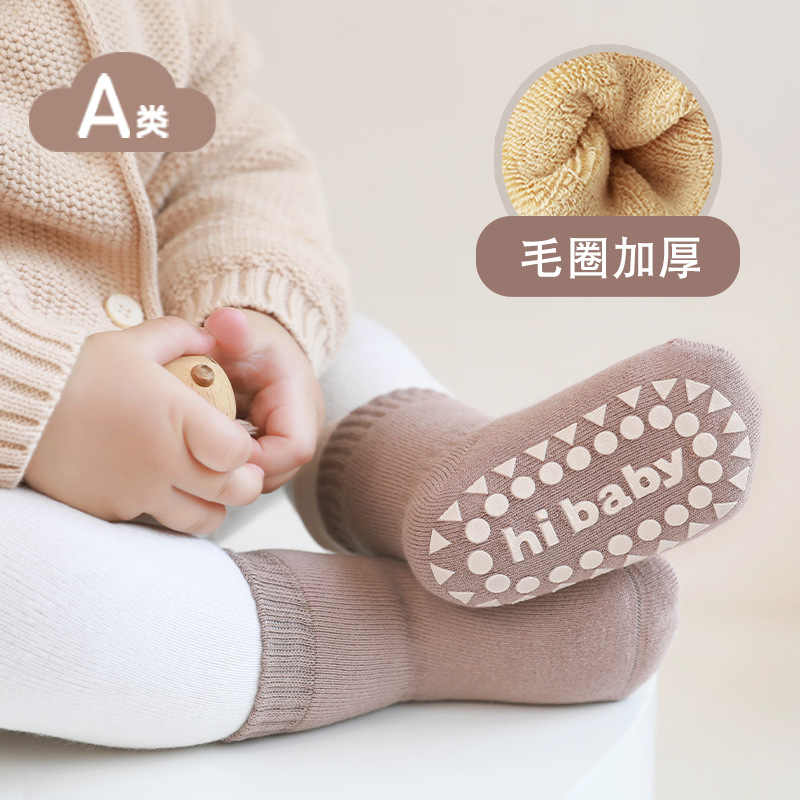 Bebé calcetines de piso otoño e invierno sin hueso engrosado Terry interior antideslizante dispensación niños y niñas niño mediados de la pantorrilla Calcetines
