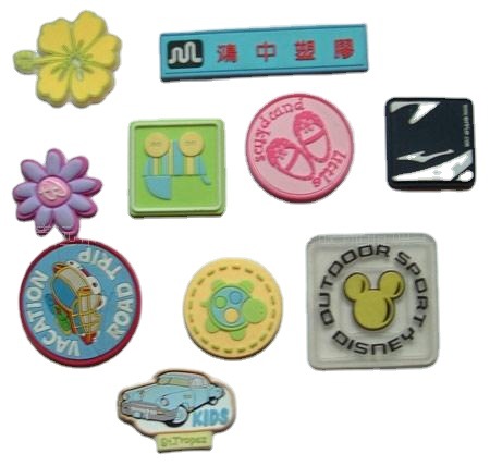 厂家供应书包胶章 登山包PVC胶章 旅行包胶章 耳机孔胶章 滴胶章