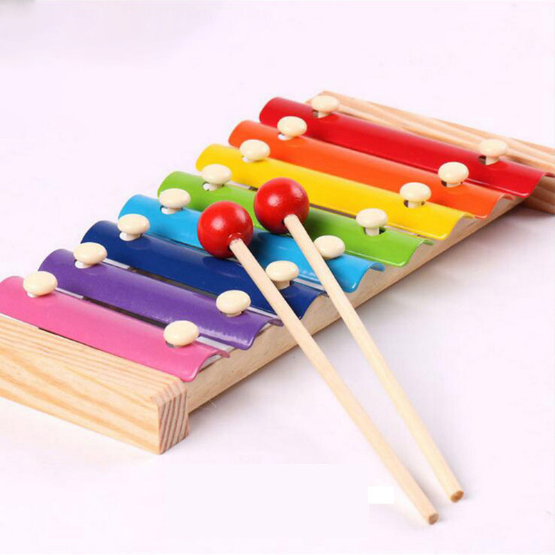 Wooden eight tone small percussion qin for children's simple musical instruments, early education, puzzle, hand percussion qin, wooden toys with qin scores wholesale