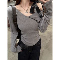 デザイン感のある蝶結びのストラップの斜めの肩の長袖のtシャツの女性の秋の独特な美しい不規則な修身の小さい上着