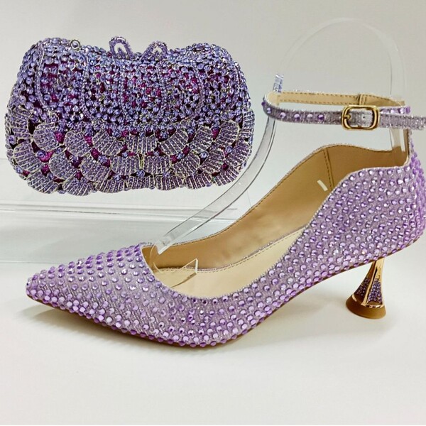 Fashionable high heels with bow for bride with a strap