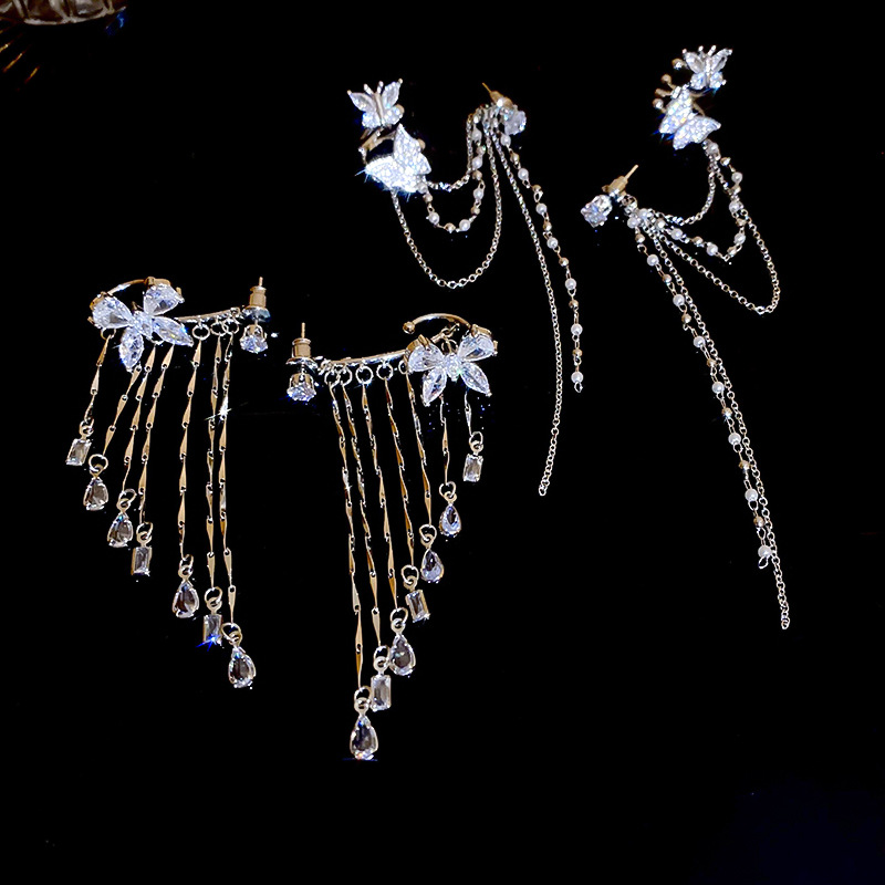 Elegant earrings with zircon with tassels