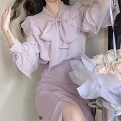 フランスのレトロで優しい気質は蓮の葉の蝶結びの長袖のシャツの女性の春の新型の洋風の百合の上着を結びます。
