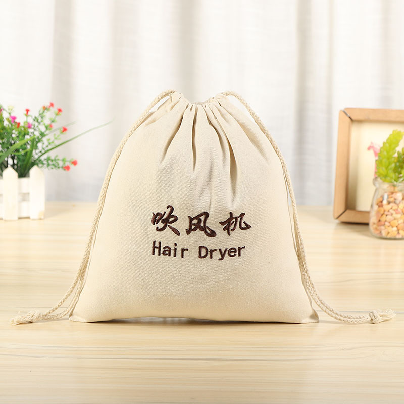 En stock inglés bordado lienzo bolso con cordón al por mayor algodón bolsa de polvo del hotel secador de pelo cubierta bolsa de almacenamiento