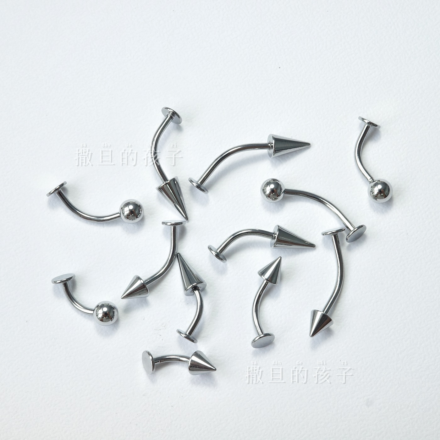 Silver pointed spike labret stud material detail
