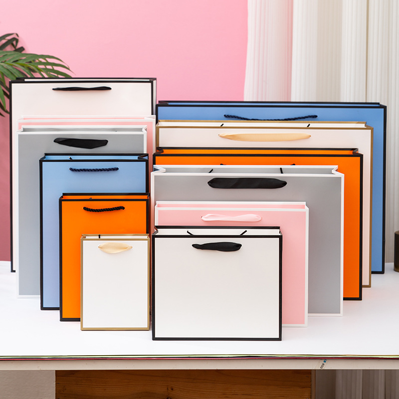 边框白卡纸手提袋礼品手提袋服装礼品手提纸袋现货可加印LOGO