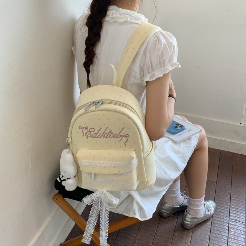 Mochila de letras onduladas para mujeres 2026 nuevo arco de encaje dulce mochila diaria mochila de verano ligera