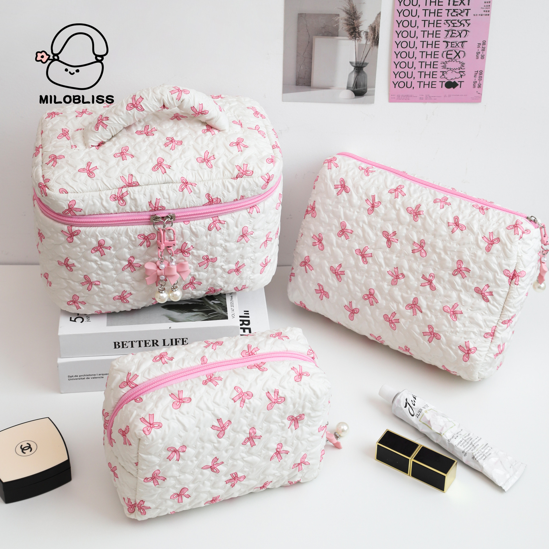 capacious handheld cosmetic bag with bow
