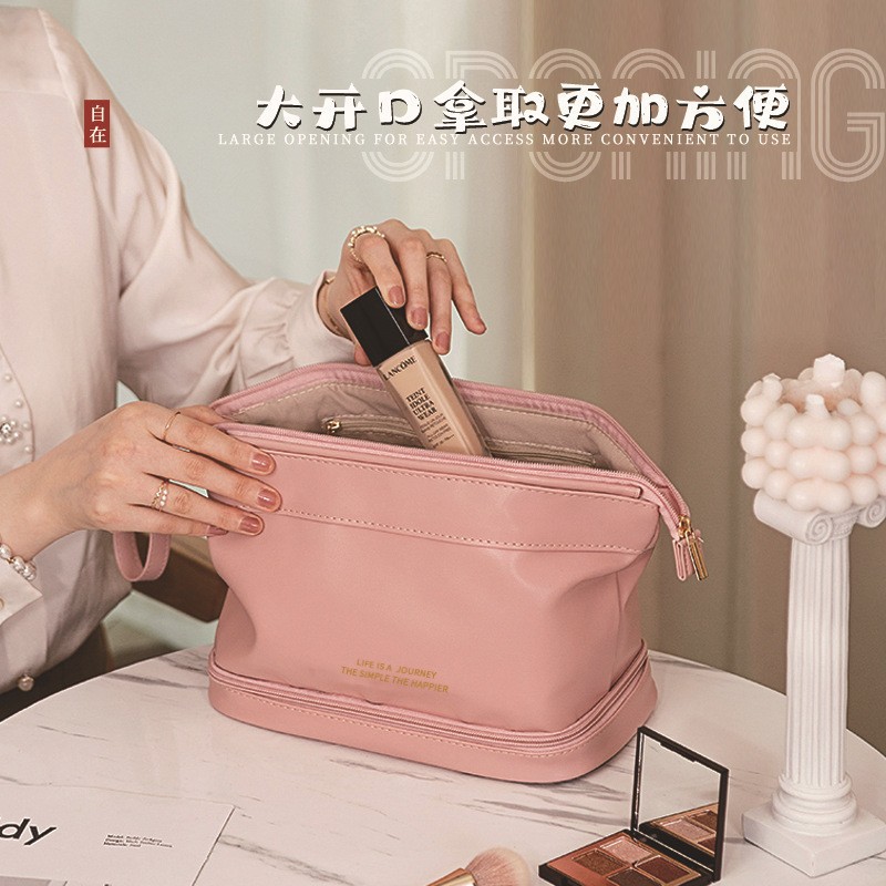 En stock bolsa de cosméticos en la nube transfronteriza de alta apariencia de gran capacidad simple portátil de viaje de doble capa bolsa de almacenamiento portátil