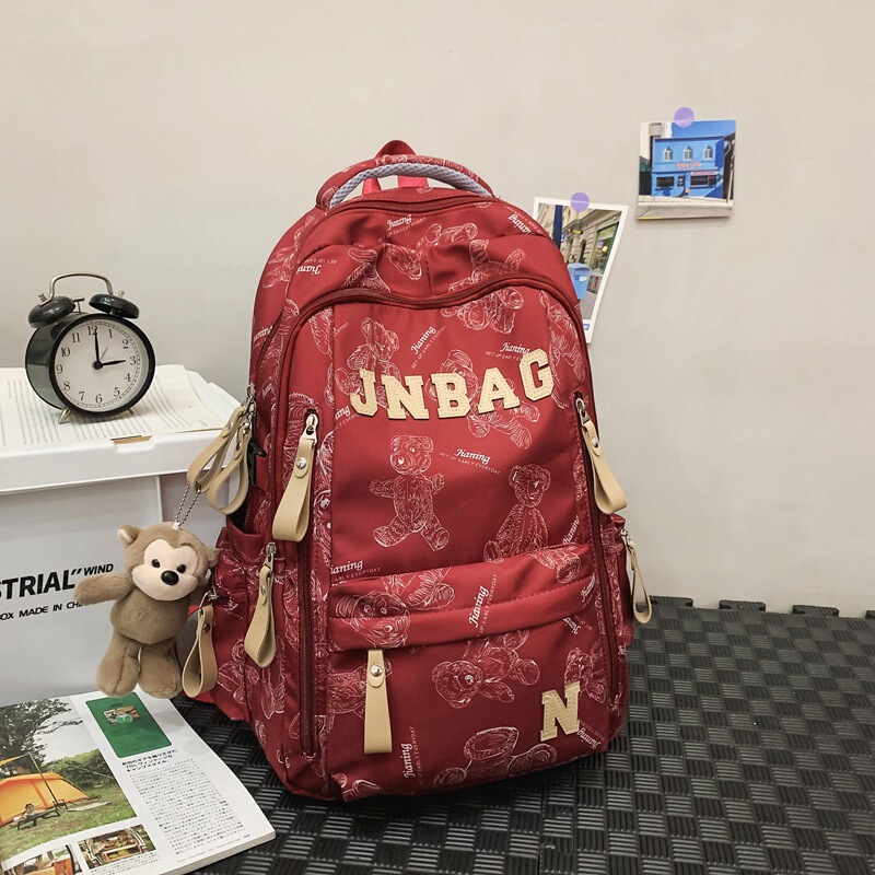 减负书包男生高中生大容量双肩包初中女生印花大学生休闲旅行背包|undefined