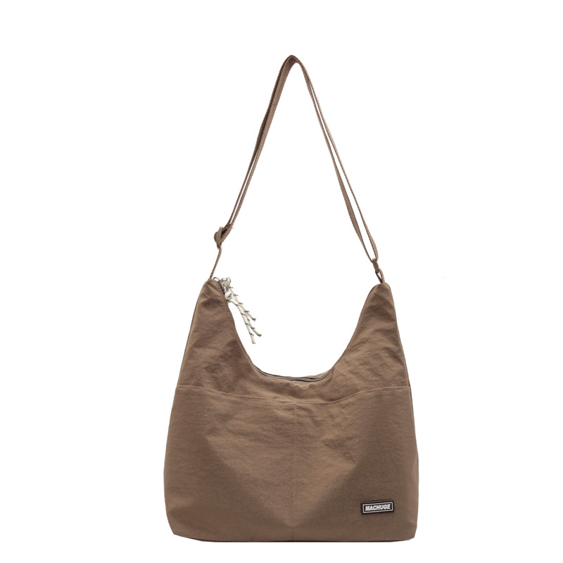 Bolso Tote de todo fósforo de moda para mujer 2024 nuevo bolso de hombro coreano popular de este año bolso de clase de gran capacidad para estudiantes universitarios