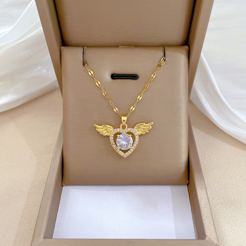 Collar de corazón con alas en acero titanio y diamantes_voghion.com