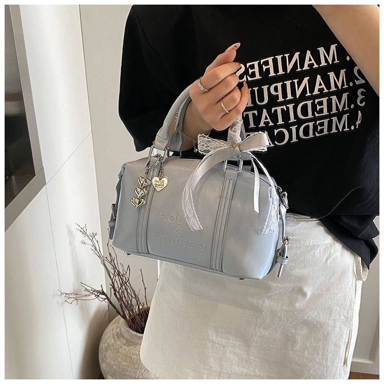 2025春夏新款蝴蝶结法棍手提包潮流复古百搭通勤单肩斜挎女包包邮