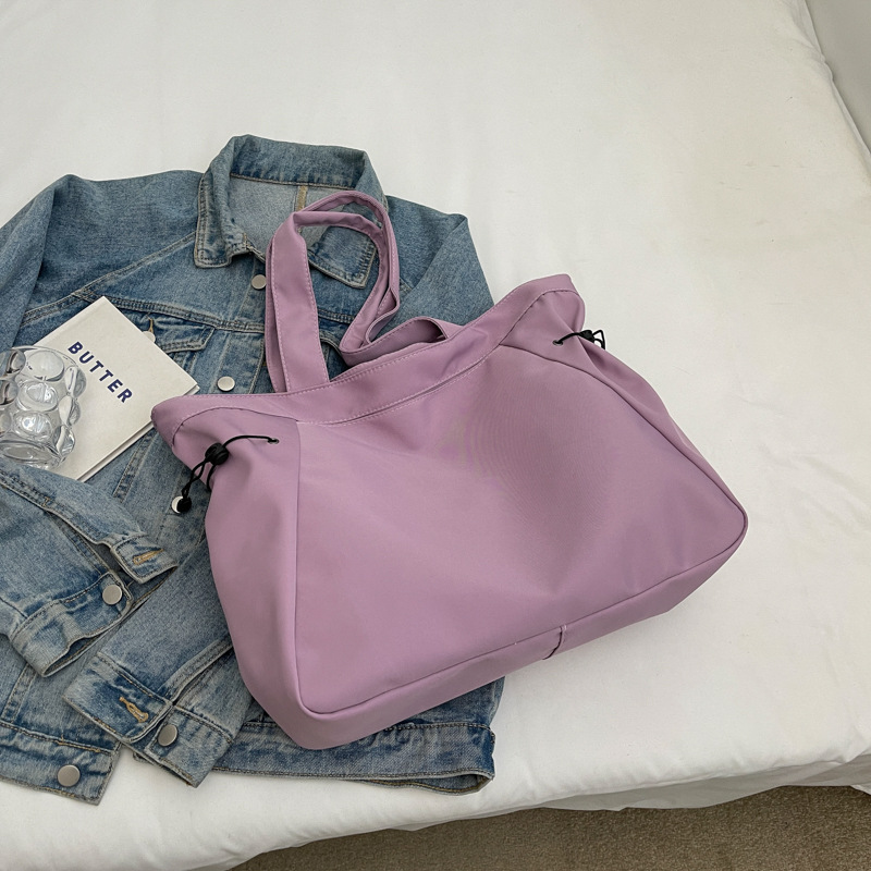 Bolso casual coreano de moda de gran capacidad de color puro 2024 primavera nuevo bolso de axila de un solo hombro ins de todo fósforo