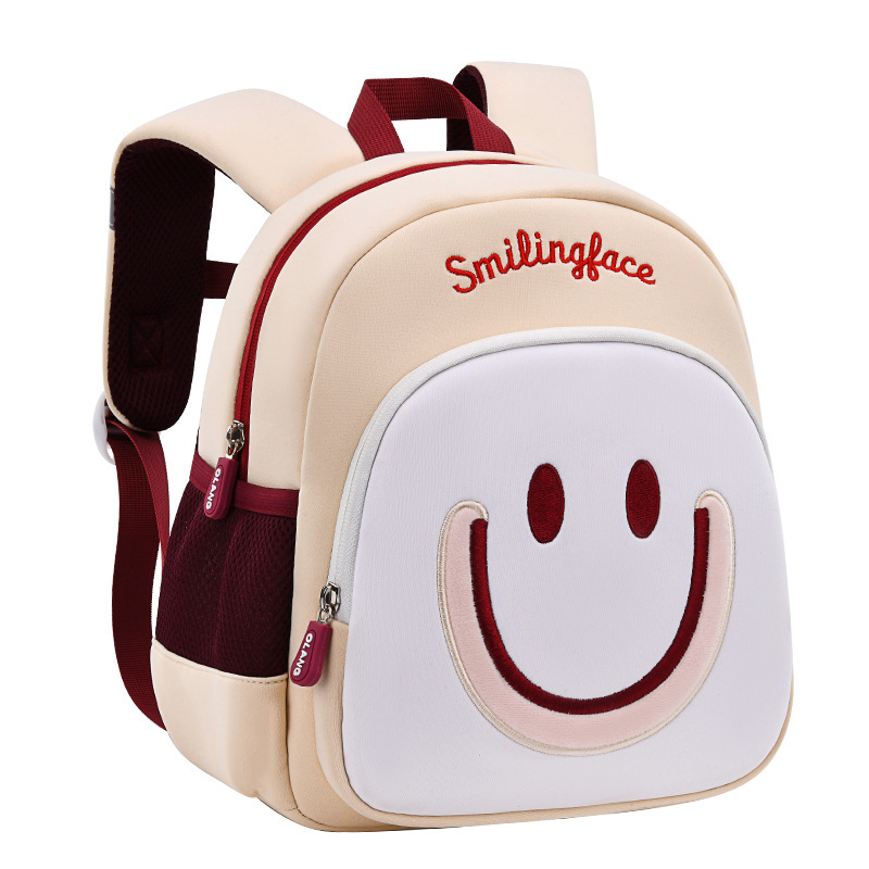2023 Nueva Linda cara sonriente mochila de jardín de infantes bolsa de escuela para niños súper ligera que reduce la carga