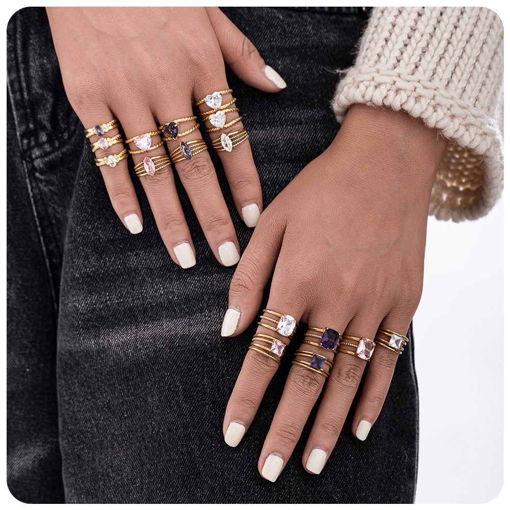 TENA oro de 18 quilates de color zirconos viento de alta calidad anillo de lujo ligero de moda joyas de acero inoxidable