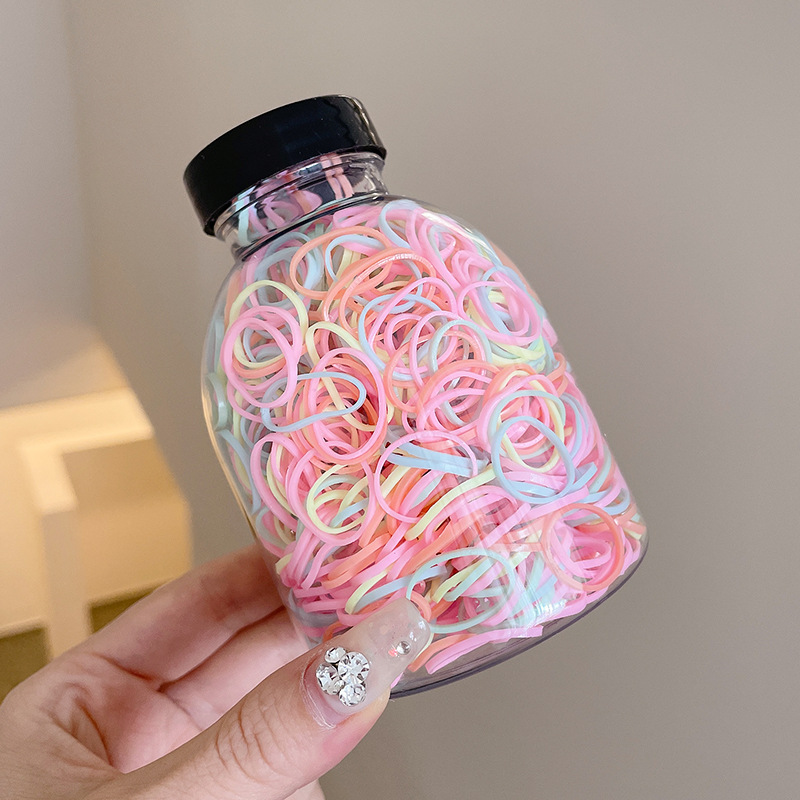 Las bandas de goma desechables de color para niños no dañan el cabello, alta elasticidad y durabilidad