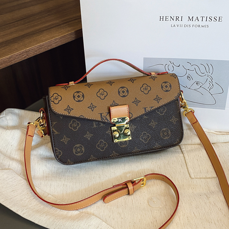 Bolso de textura transfronteriza 2025 verano nuevo bolso femenino retro impreso bolso de hombro moda contraste color bandolera marea