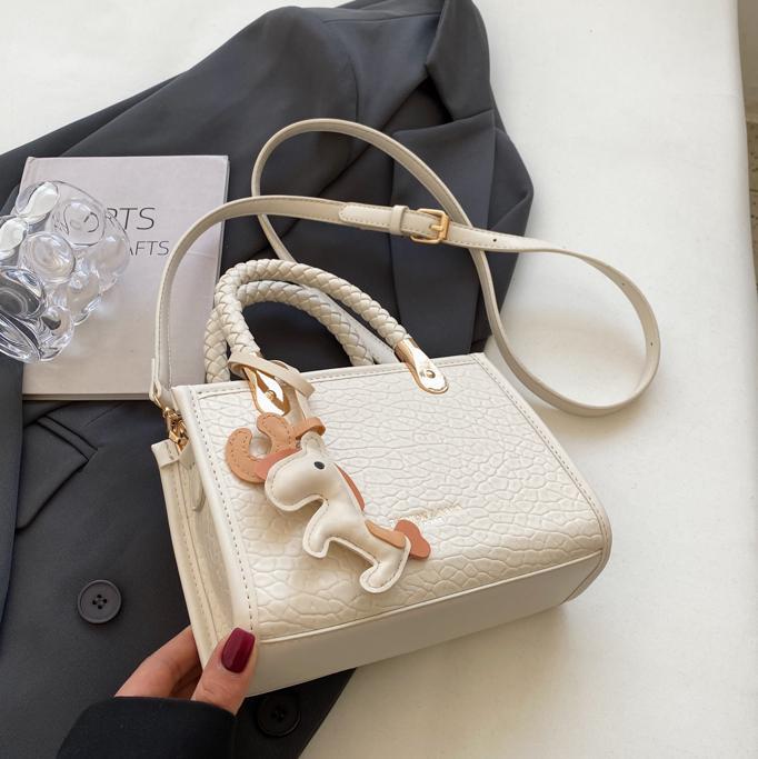 Bolso de mano transfronterizo para mujer 2025 nuevo estilo coreano simple y moderno bolso cuadrado pequeño bolso de mensajero de hombro de moda de viaje salvaje