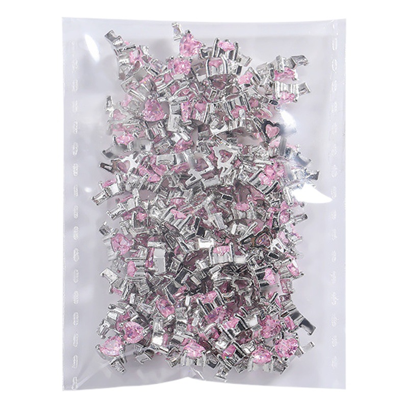Populares en línea celebridad manicura LZ estrella cerradura corazón textura aleación ZIRCON nuevo diamante arco decoración de uñas al por mayor