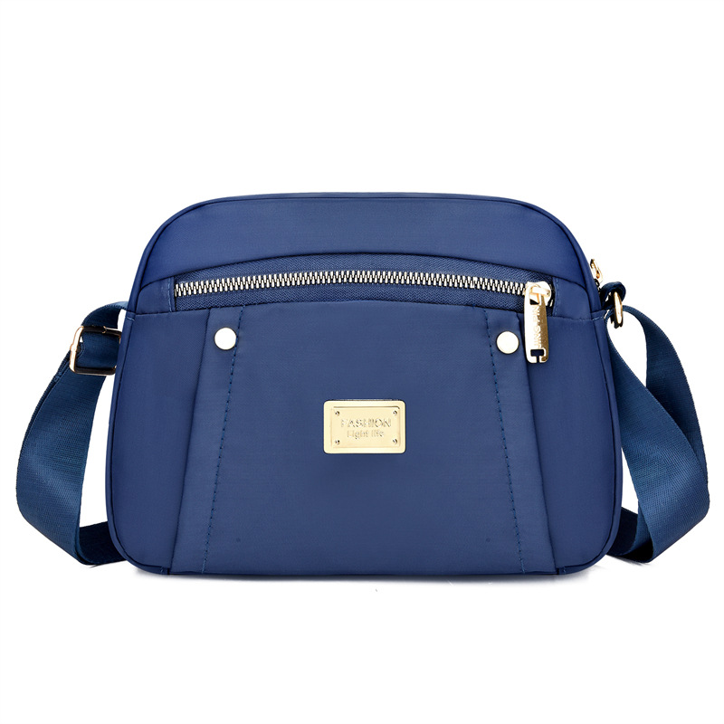 Bolsa de mensajero de tela Oxford para mujer 2023 nueva primavera de mediana edad para mujer bolsa de viaje de gran capacidad hombro nylon madre bolsa todo a juego
