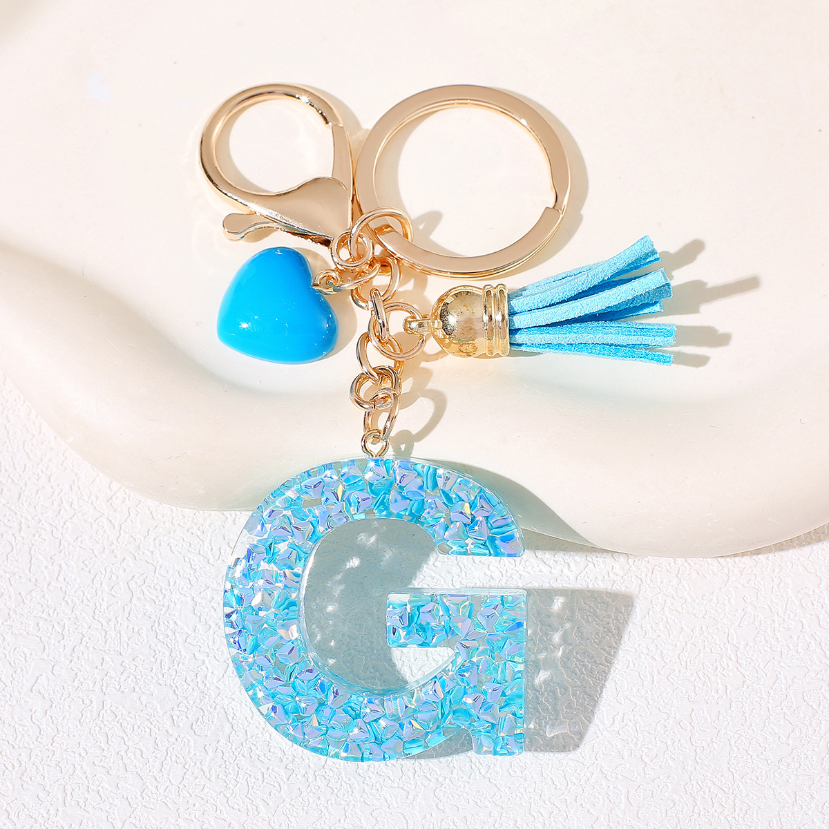 Nuevos productos azules de amor con frascos de letras lindos enclavadores decoraciones europeas y americanas populares llaveros damas