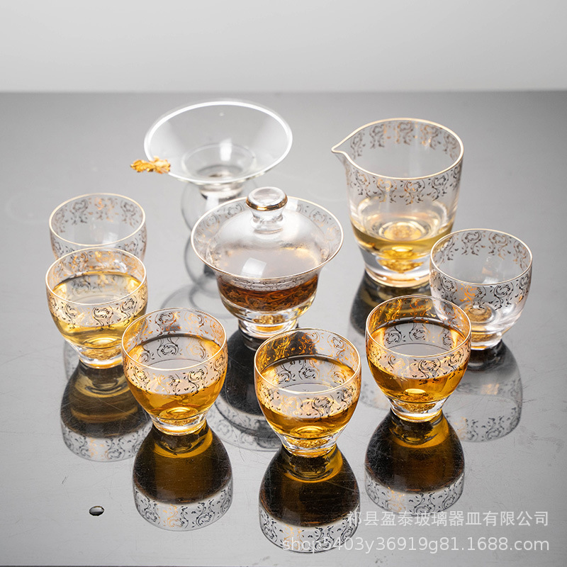 Conjunto de té de vidrio retro chino con lámina de oro creativo de alto valor de cara taza de té kung fu taza de copas de copas de alta calidad caja de regalo