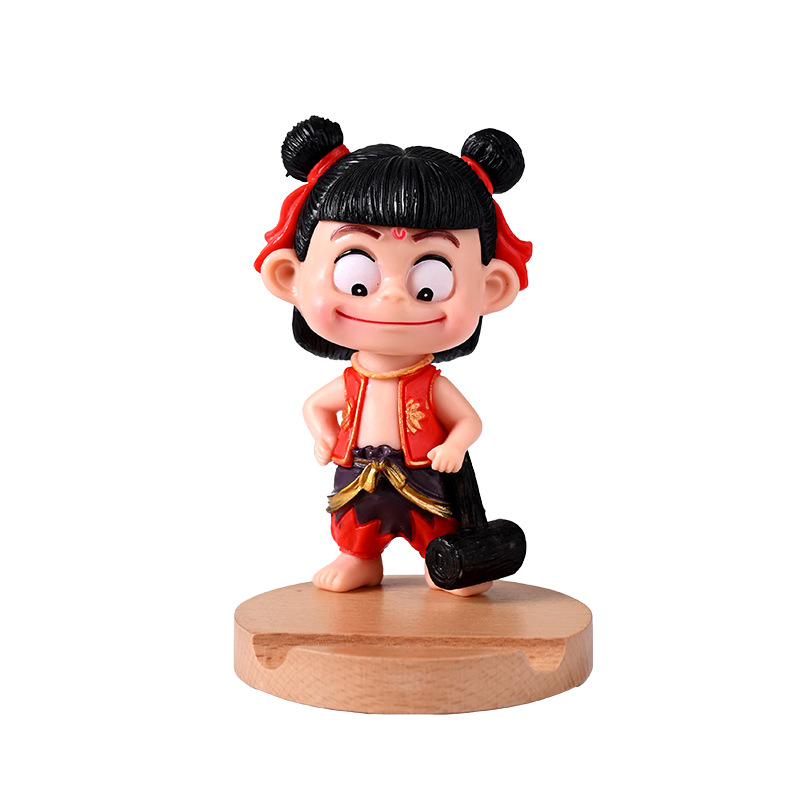 La celebridad de Internet Nezha's Devil Boy Naohai, el soporte para teléfono móvil que rodea el mundo, el soporte para teléfono móvil de madera Nezha Lingzhu, decoración de escritorio