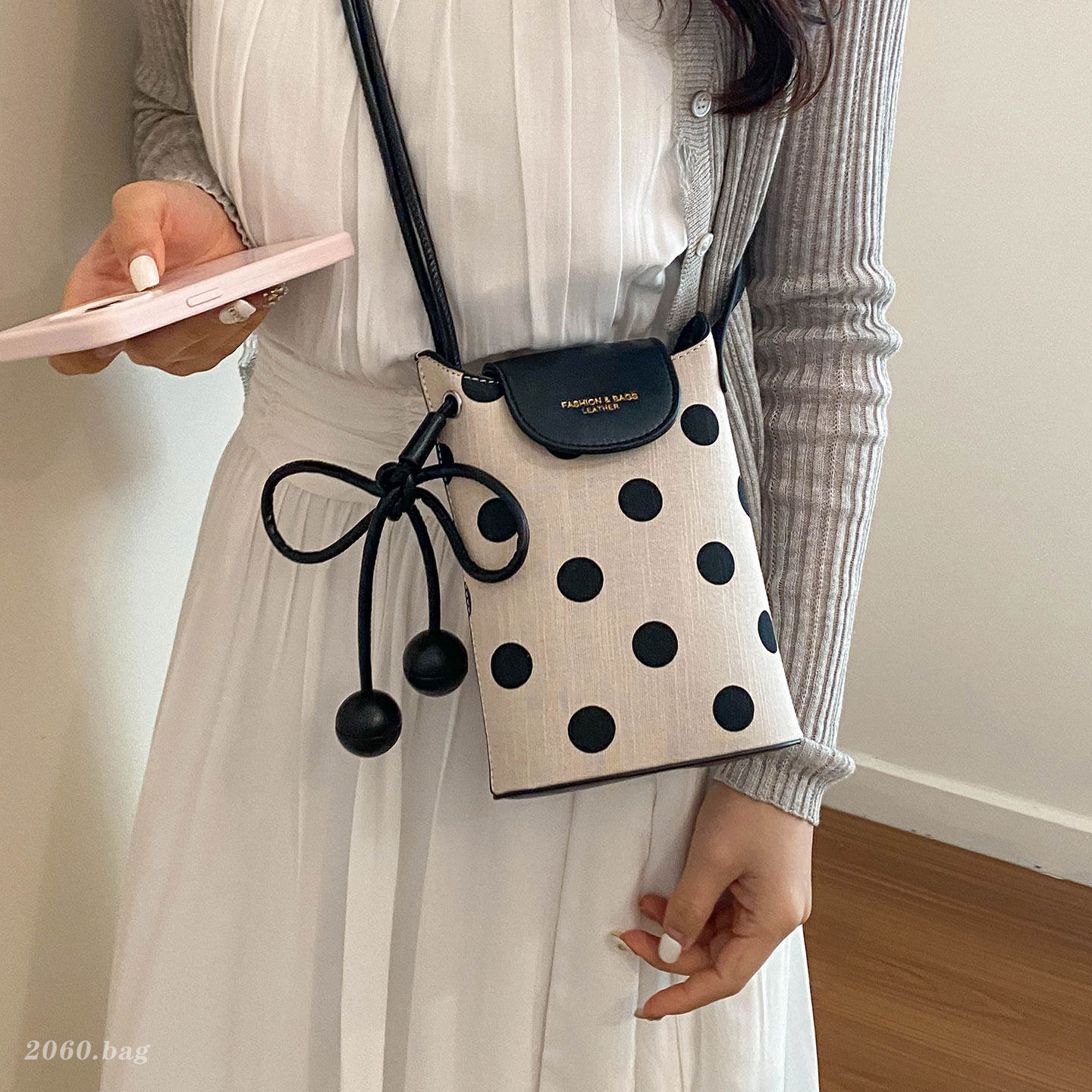 Un hombro de moda de viaje nuevo punto de onda bolso superfuego bolso de mochila para mujeres verano 2026 sensación coreana