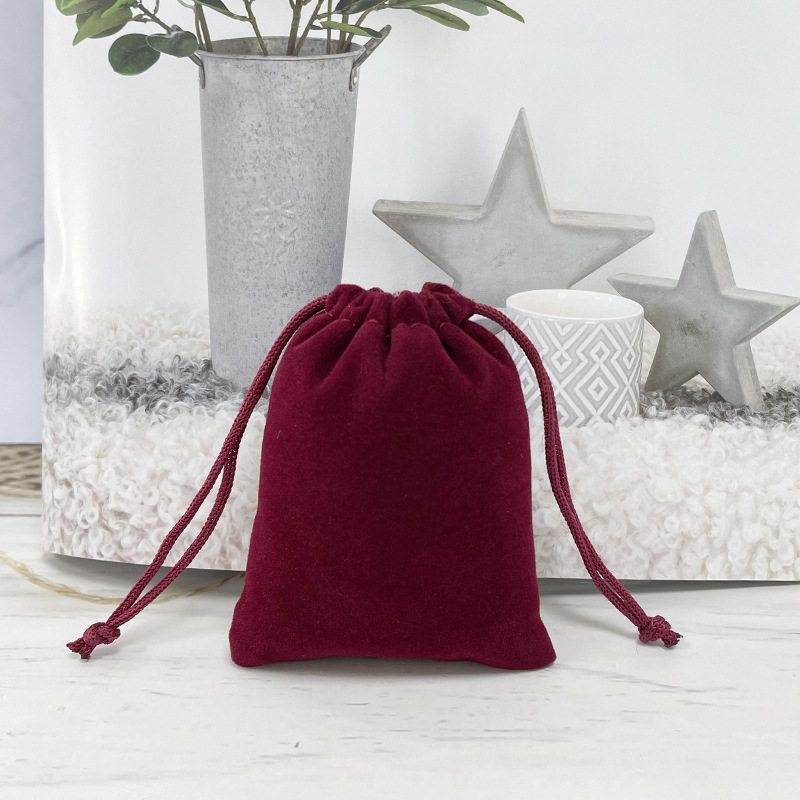 Bolsa de franela de joyería al por mayor venta directa de fábrica de cosméticos auriculares banco de energía a prueba de polvo almacenamiento bolsillo de cordón de joyería