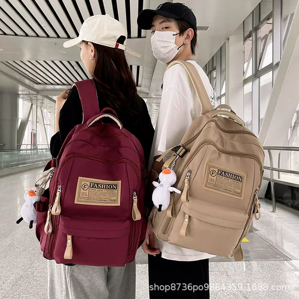 Schoolbag Women's Large Capacity Senior high school Junior High School Students College Backpack Male Primary and Secondary School Students Grade 3-6 Weight Reduction Wear-resistant Backpack