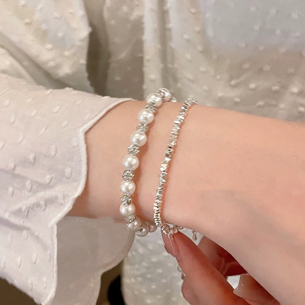 Pulsera de plata rota de perlas de circón de lujo ligero francés, pulsera simple de nicho, pulsera de todo fósforo, joyería de alta gama femenina de verano