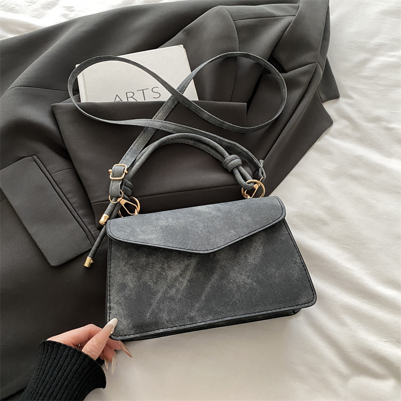 Bolso público pequeño para mujeres 2026 nuevo bolso cuadrado de alta calidad sensación de diseño retro bolso de hombro simple bolso de mano