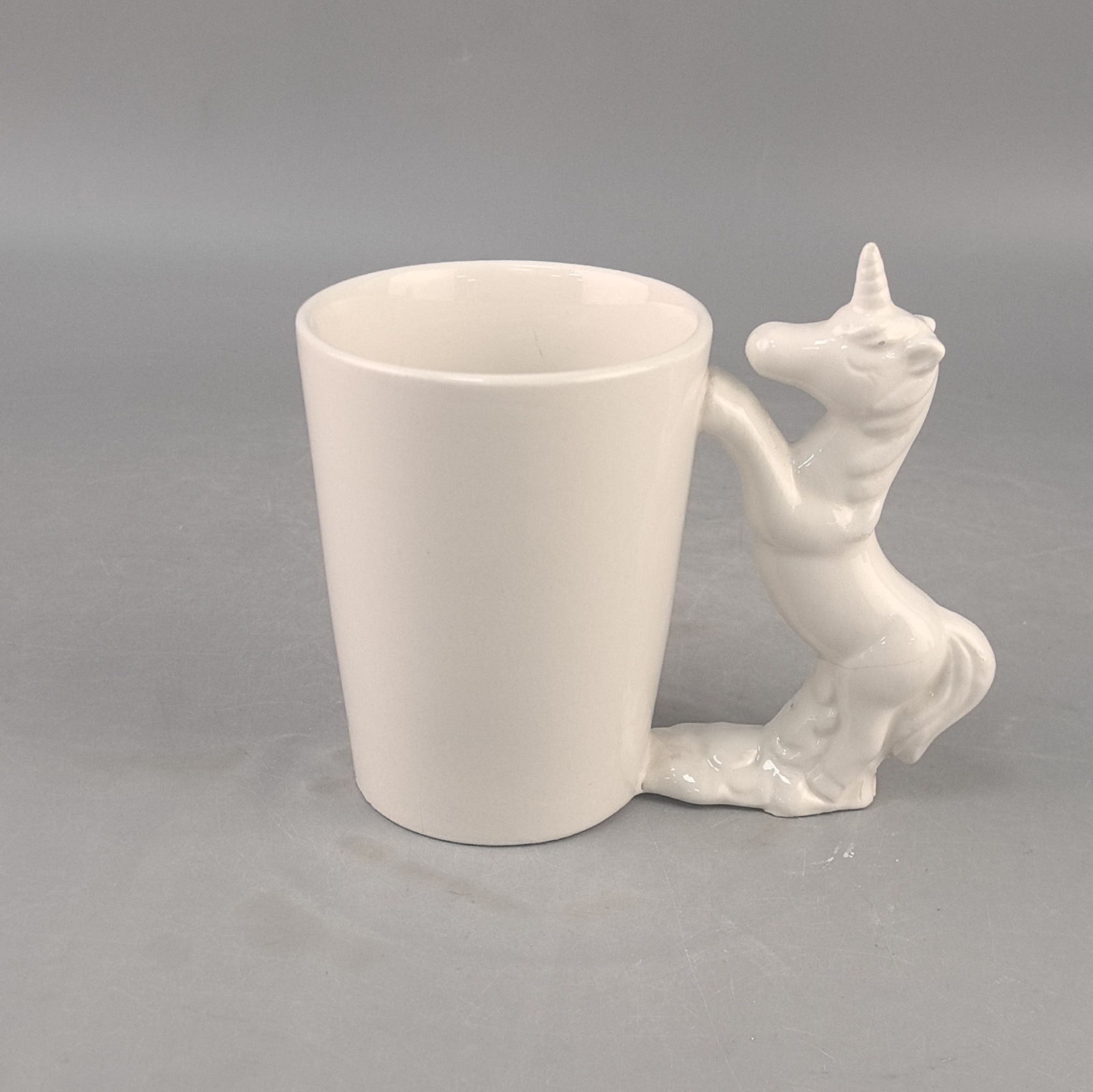 Taza de modelado de cerámica transfronteriza de fábrica animal arco iris mango de caballo forma especial taza de café creatividad de regalo de vacaciones