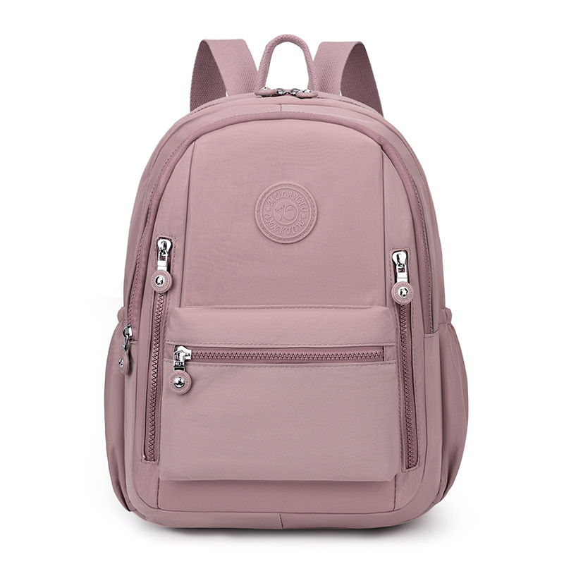 Mochila femenina 2025 nueva mochila de viaje de moda de gran capacidad, ligera tela de nylon casual y bolso de hombro