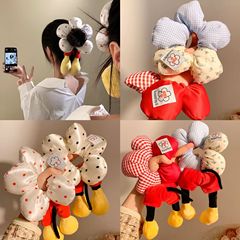 ミッキーのお尻の髪の輪ネットの赤い本は団子の髪のひもの漫画のかわいい特大サイズの花のひもの髪飾りを刺します。