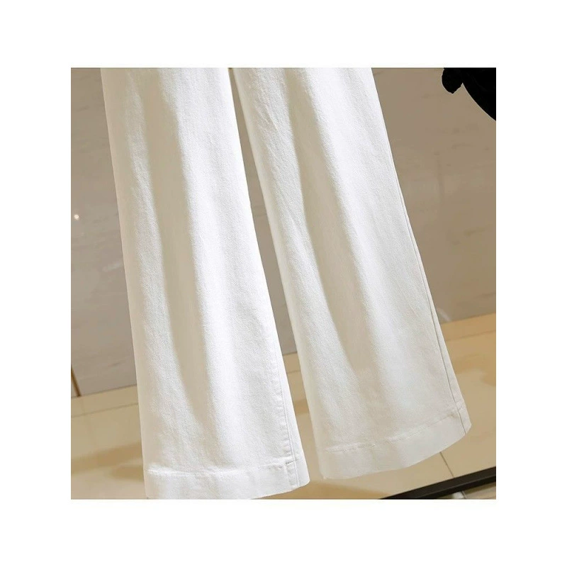 Apricot colored spring jeans, trousers, megaphone, high waist, trend of season, loose straight fit