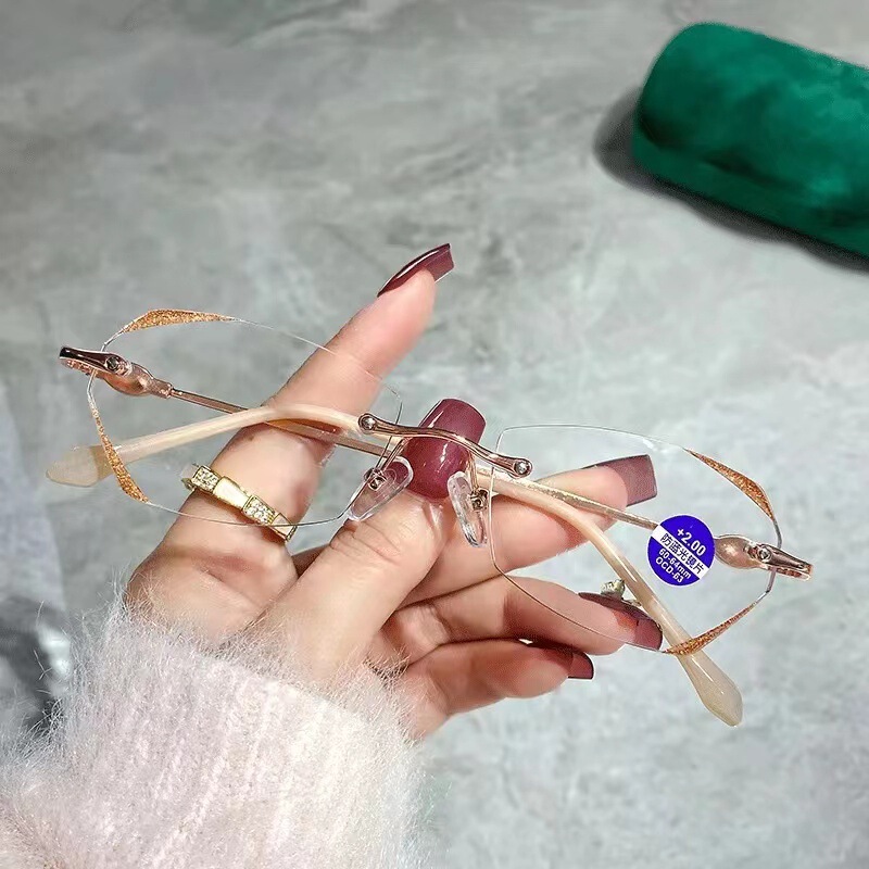 New Trimmed Starlight Thin Flash Diamond Anti-Blue Light Presbyoscopic Glasses Shake Tone Same Style Women's Presbyoscopic Glasses Rimless Glasses New Trimmed Starlight Thin Flash Diamond Anti-Blue Light Presbyoscopic Glasses Shake Tone Same Style Women's Presbyoscopic Glasses Rimless Glasses