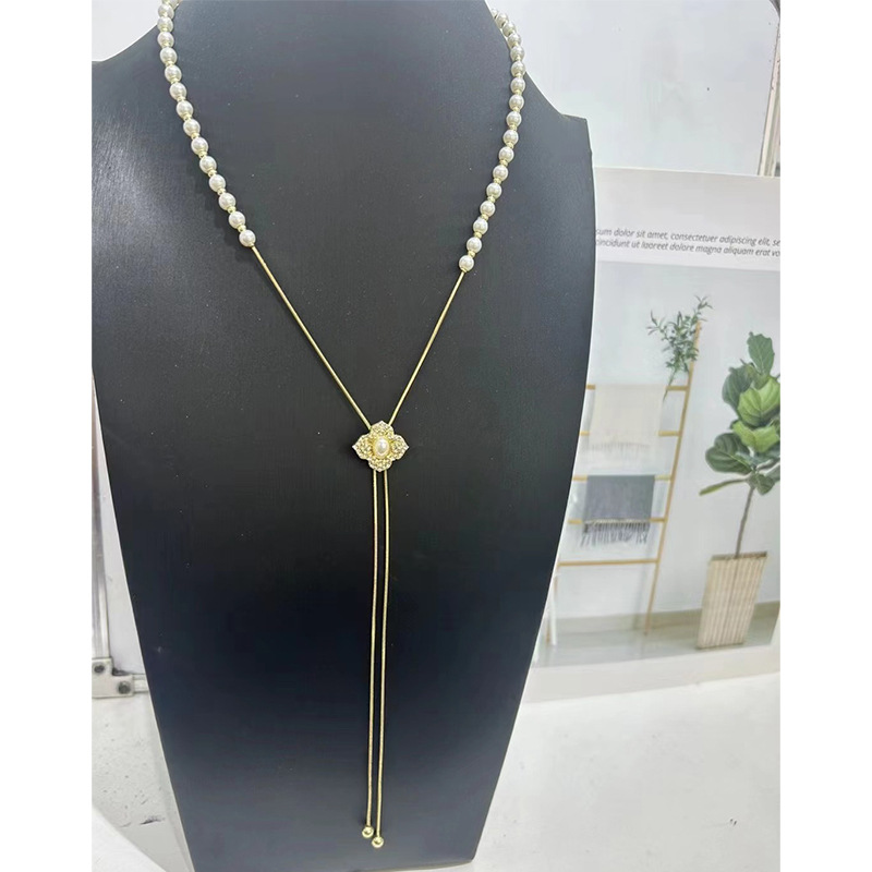 Collier de perles à tirer pour femme, chaîne ras du cou à pompon papillon haut de gamme et polyvalente, chaîne tendance unique pour pull_voghion.com