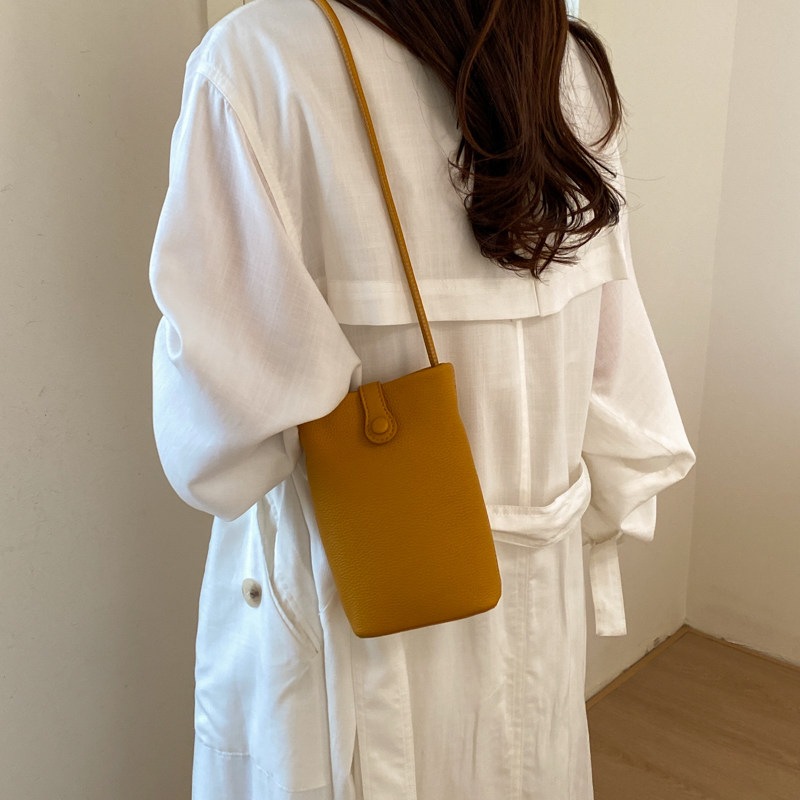 Nuevo mochila ligero verano 2026 teléfono móvil cuero suave versátil cubo de transporte mini mochila de hombro mujer estilo coreano