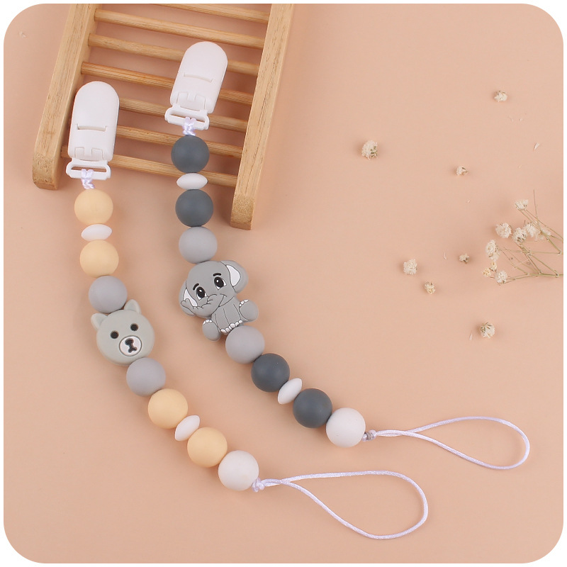 Suministros para bebés chupete cadena creativa bebé animal de silicona mordedura cadena anti-caída molar dos conjuntos